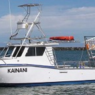 a small boat in a large body of water